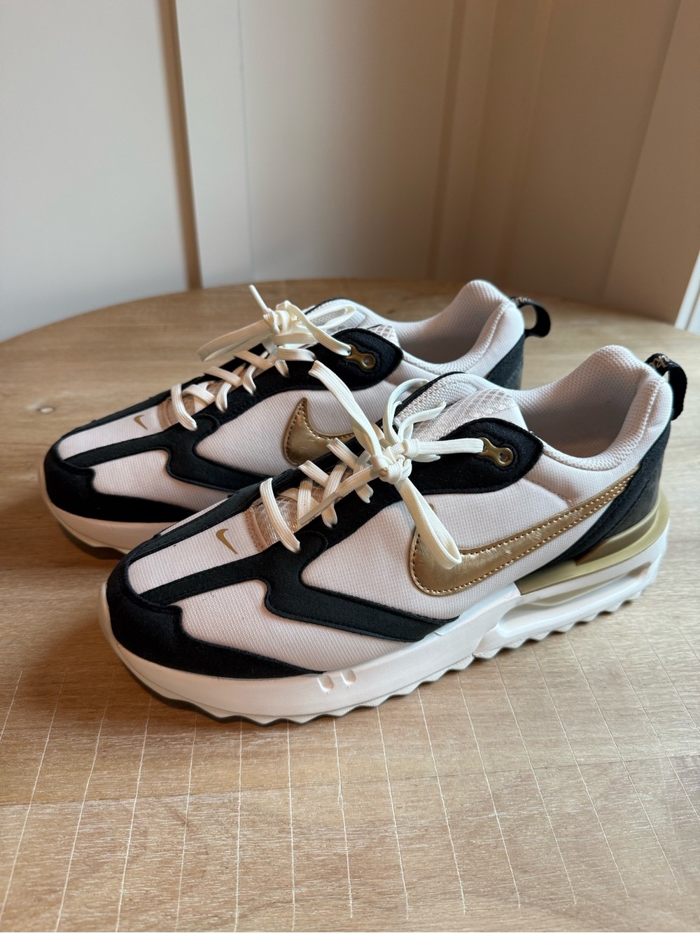 Nike, Black & Gold Low-Top Sneakers size 10